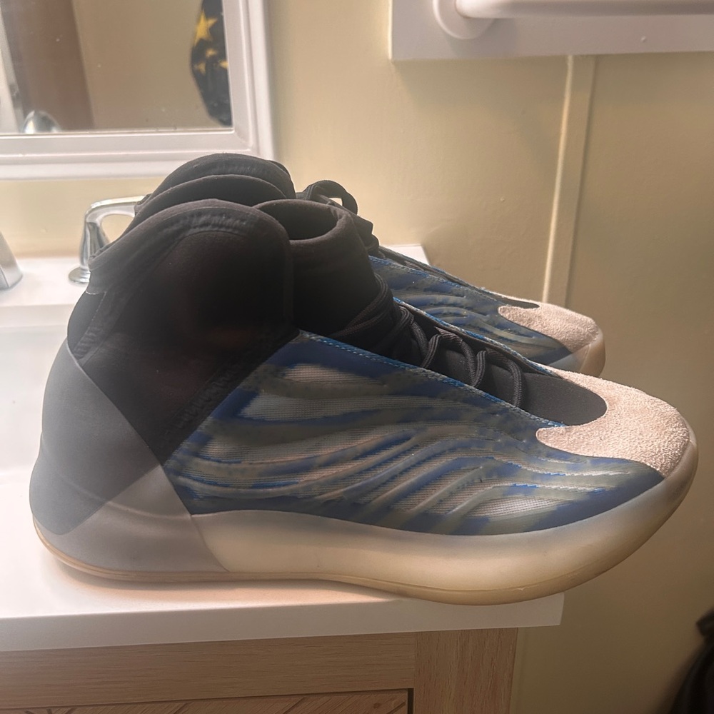 Yeezy Black and Blue Sneakers with Sleek Design